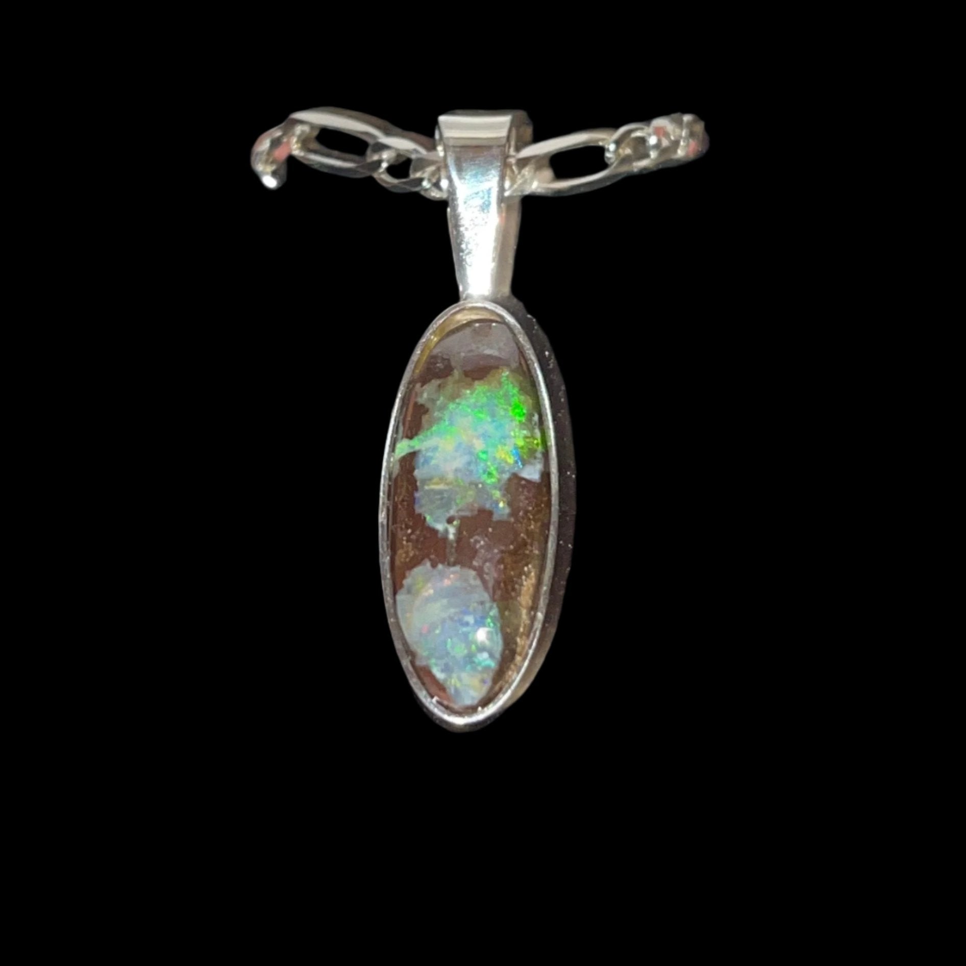 Australian Boulder Opal set in Silver Oval