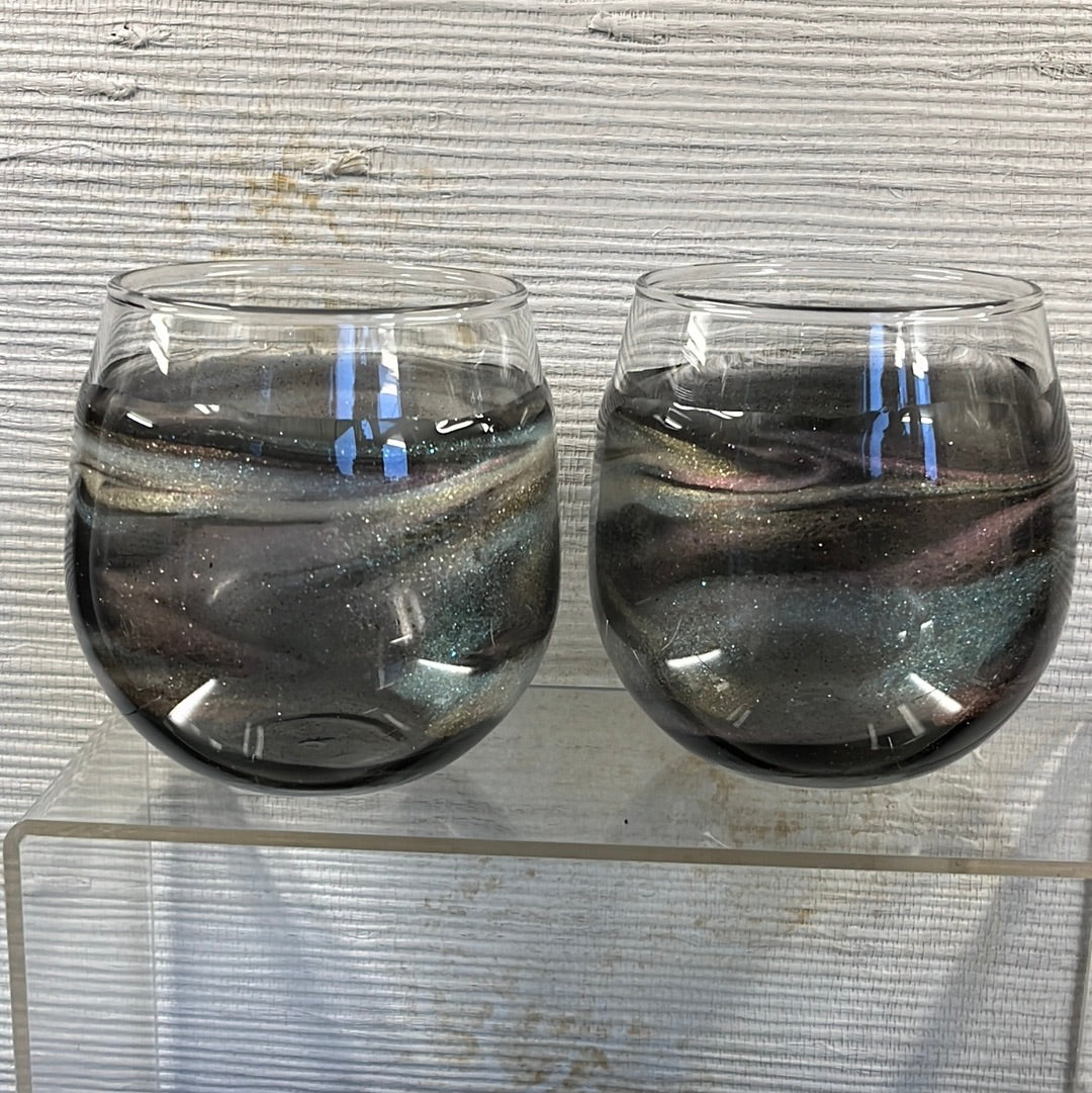 Set of 2 Translucent Gold Aurora stemless wine glasses.