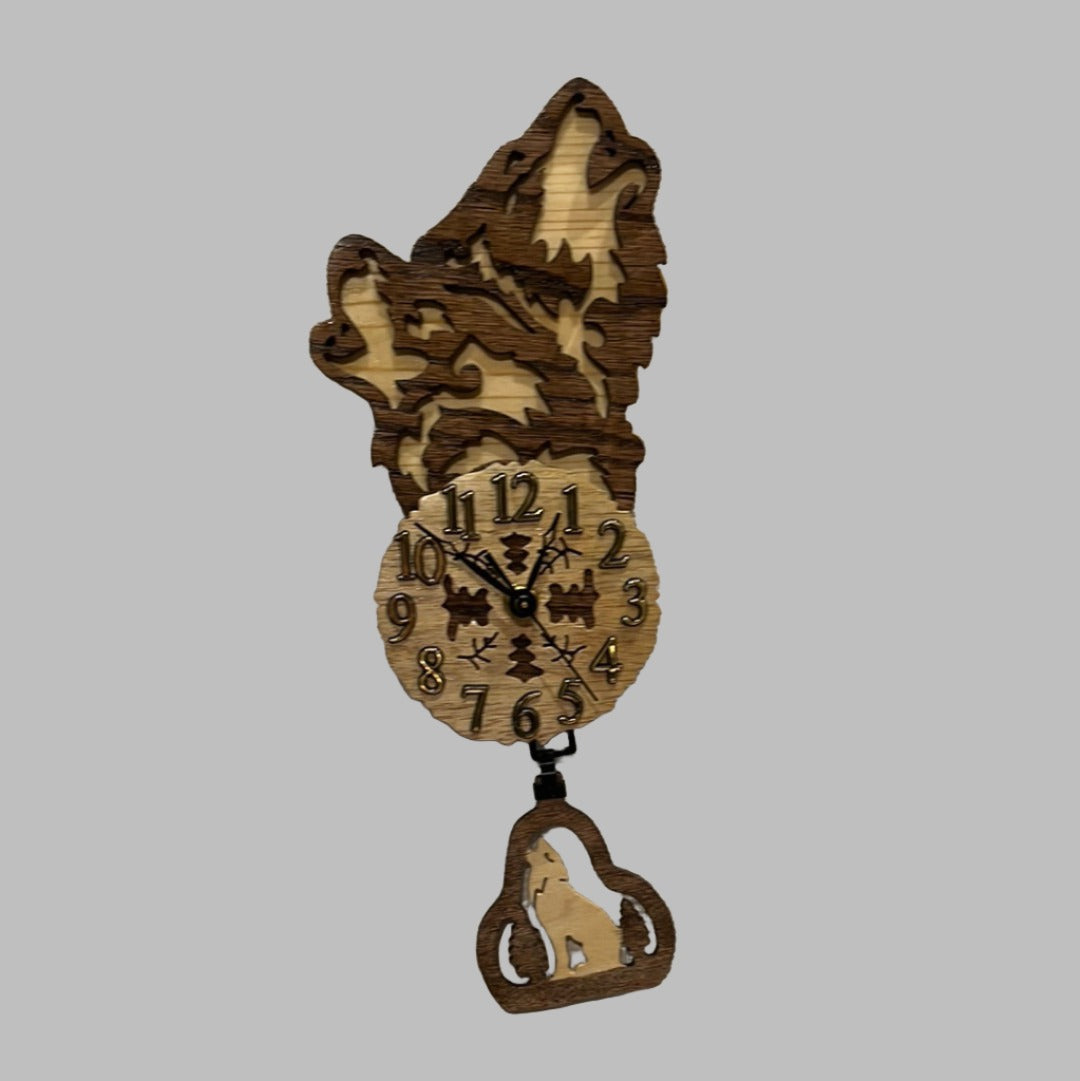 Wooden howling wolf pendulum clock, hand scroll sawed, with high quality quartz movements, designed for years of service. One AA battery included.