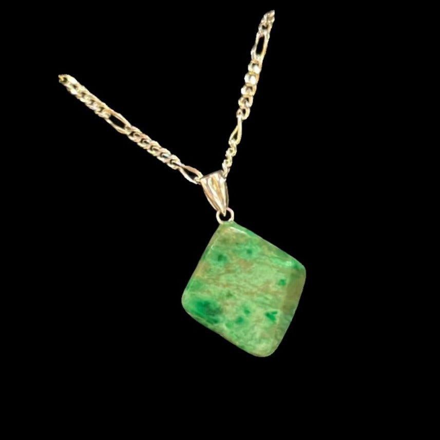 Jade pendant (Diamond shape) on silver chain. This unique piece of jewelry is authentic Alaska Native art created by an enrolled member of an Alaska Native tribe.&nbsp;