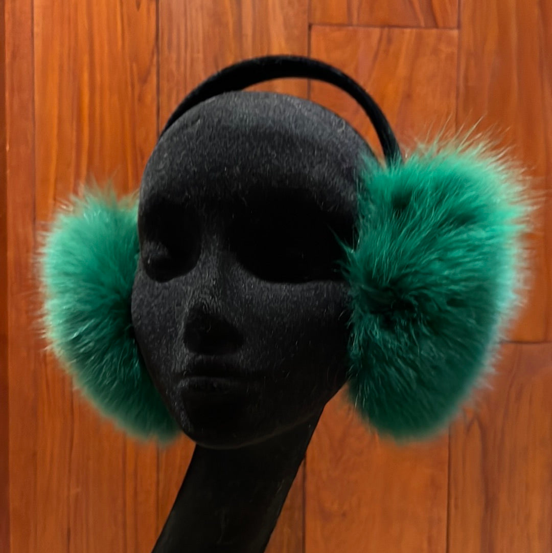 Dyed blue fox earmuffs with black velvet band, one size fits most.