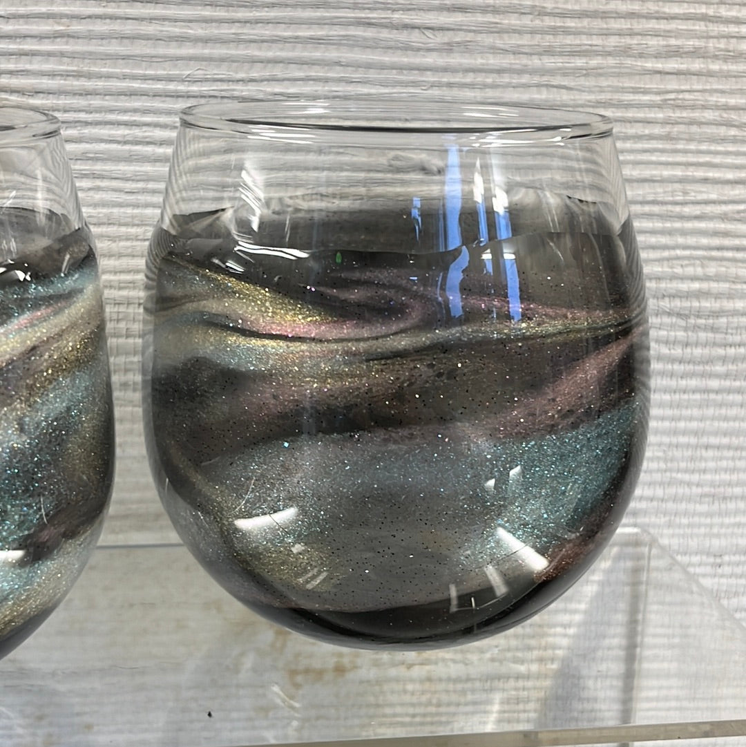 Set of 2 Translucent Gold Aurora stemless wine glasses.