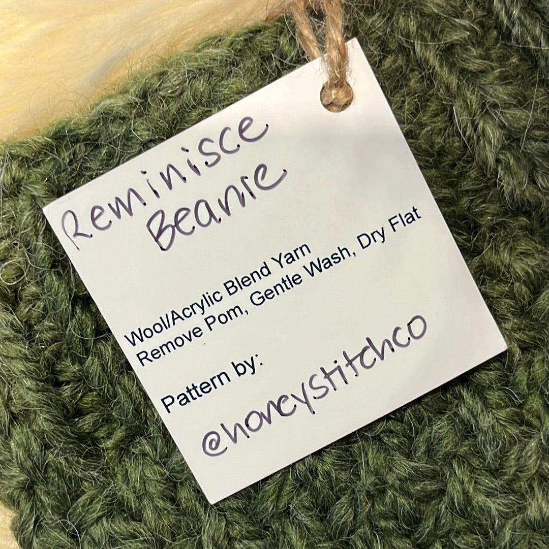 Reminisce Beanie (Green) Wool acrylic blend yarn with removable pom pom. Care: Remove pom, gentle wash dry flat.