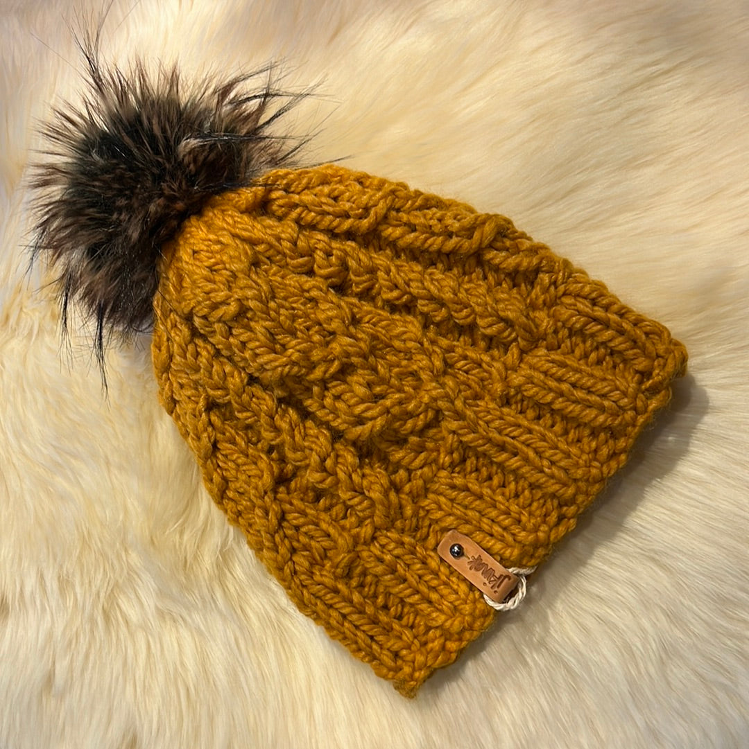 Jade Beanie (Mustard) Wool blend yarn with removable pom pom. Care: Remove pom, gentle wash dry flat.