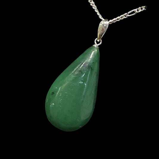 Alaskan Jade Pendant in silver. Certified Made in Alaska. This unique piece of jewelry is authentic Alaska Native art created by an enrolled member of an Alaska Native tribe.