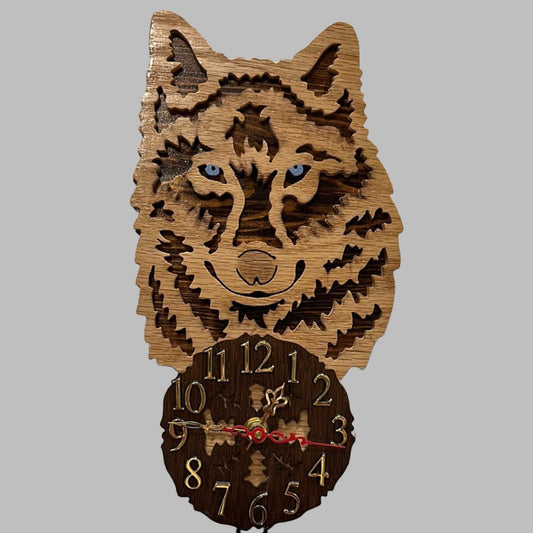 Wooden wolf pendulum clock, hand scroll sawn, with high quality quartz movements, designed for years of service. One AA battery included.