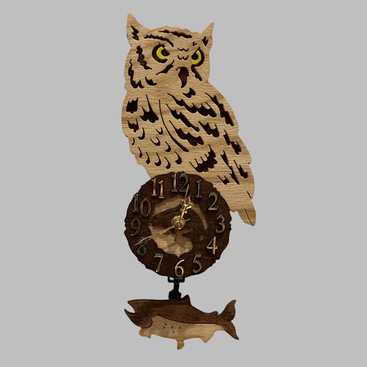 Wooden owl pendulum clock, hand scroll sawed, with high quality quartz movements, designed for years of service. One AA battery included.