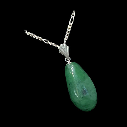 Alaskan Jade Pendant in silver. Certified Made in Alaska. This unique piece of jewelry is authentic Alaska Native art created by an enrolled member of an Alaska Native tribe.