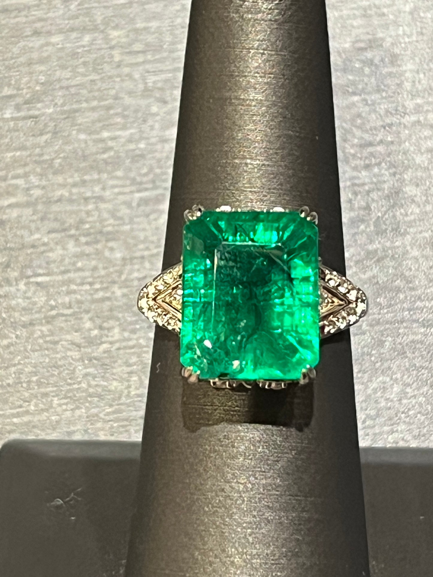 Sterling silver ring with 10.52ct Emerald (lab grown) and White Topaz. Includes certificate.