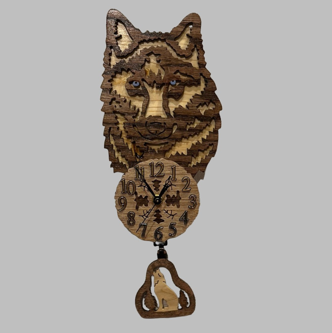 Wooden wolf pendulum clock, hand scroll sawed, with high quality quartz movements, designed for years of service. One AA battery included.