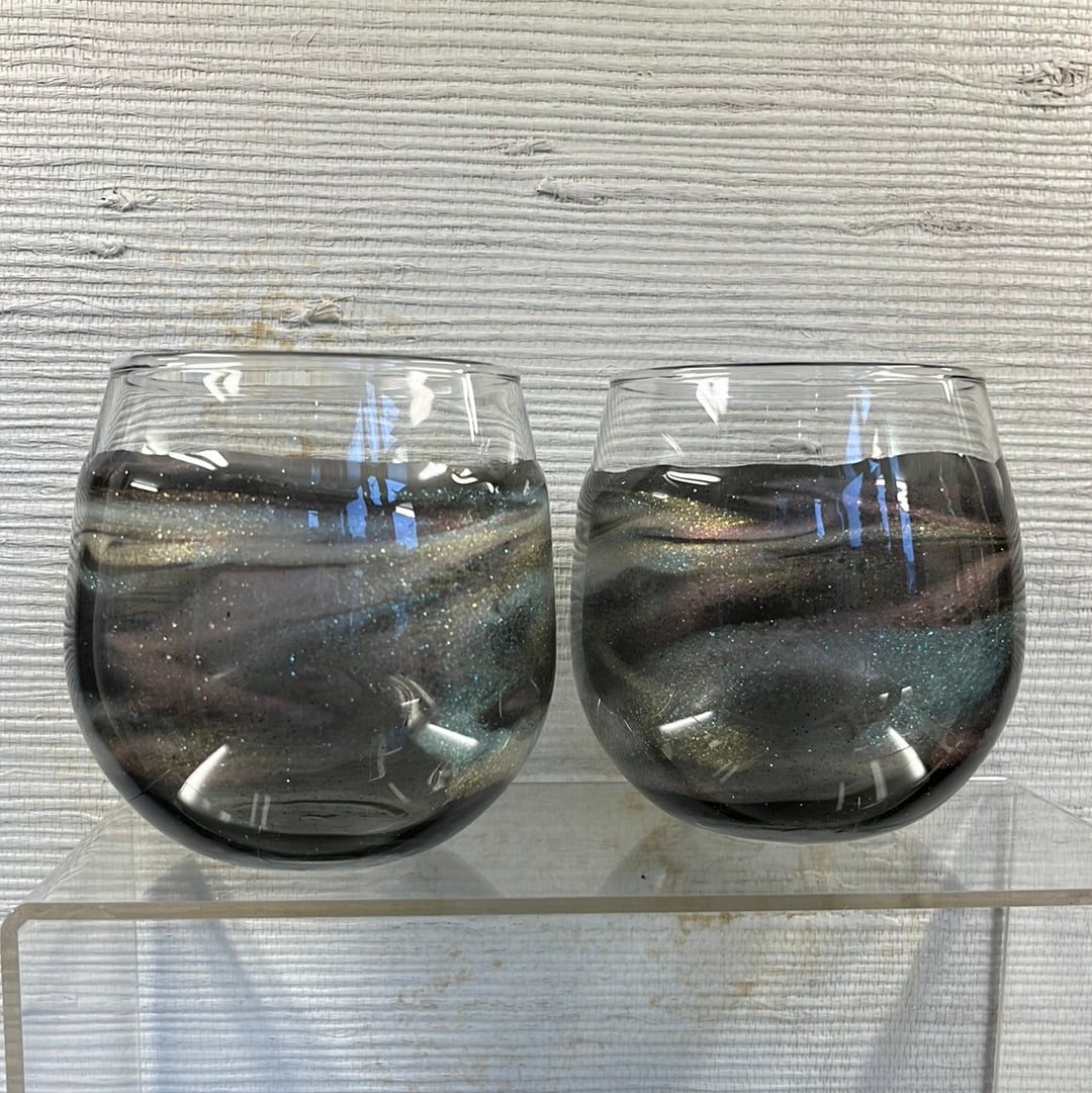 Set of 2 Translucent Gold Aurora stemless wine glasses.