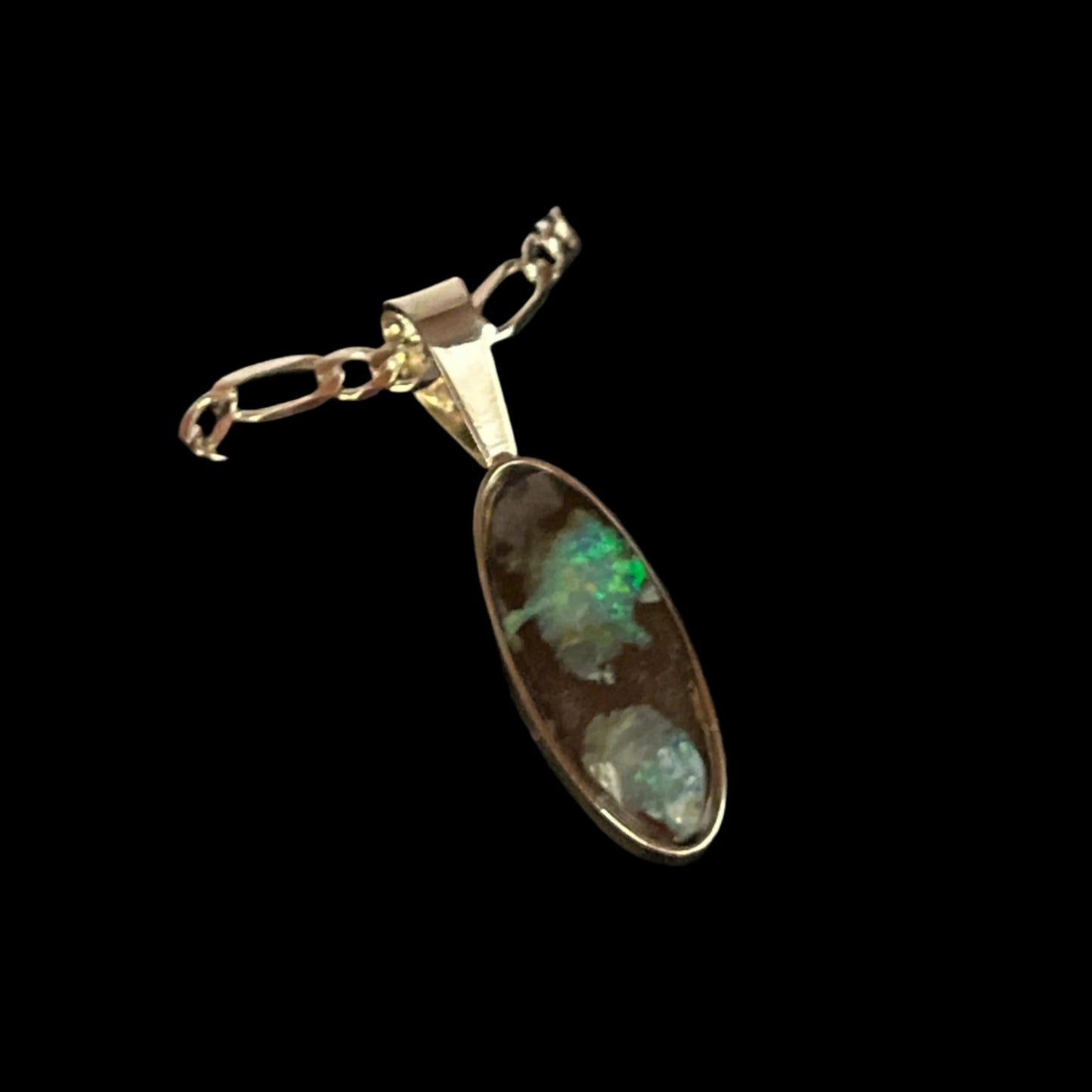 Australian Boulder Opal set in Silver Oval