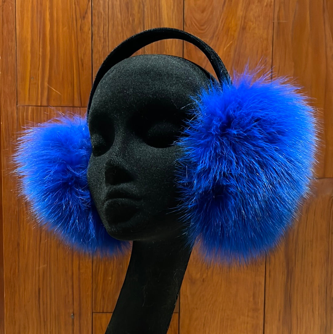 Dyed blue fox earmuffs with black velvet band, one size fits most.