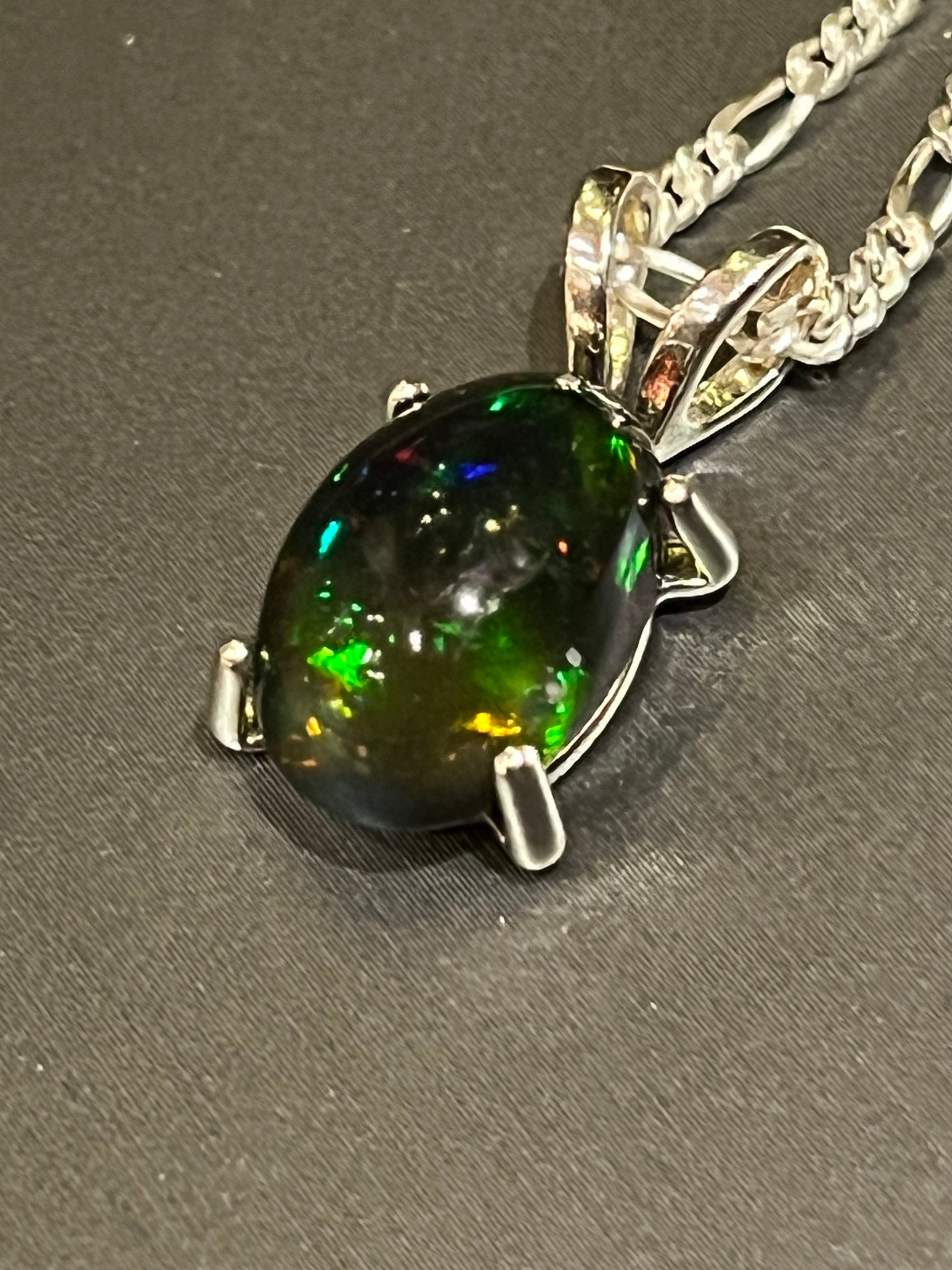 Brilliant 5.65 carat Australian Black Opal pendant in sterling. Certified Made in Alaska and Silver Hand jewelry.