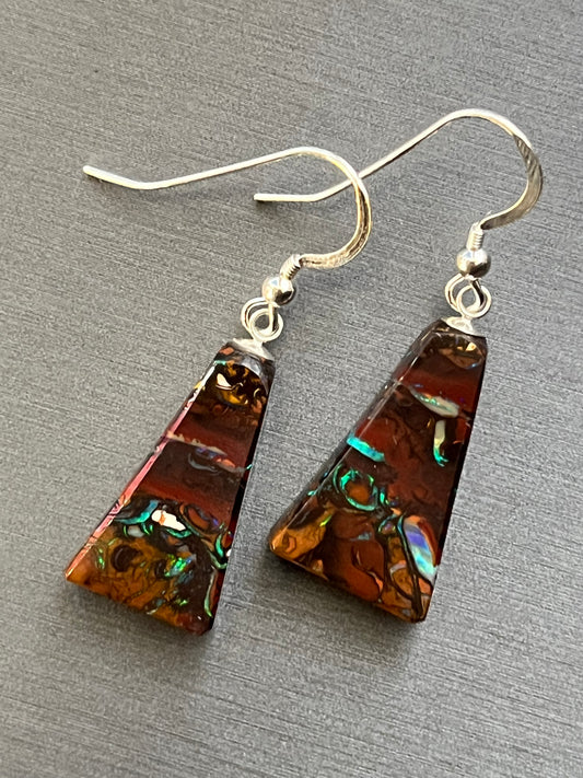 Australian Korite Opal earrings in silver in a thick pyramid shape exposing beautiful veins. This unique piece of jewelry is authentic Alaska Native art created by an enrolled member of an Alaska Native tribe. Certified Silver Hand and Made in Alaska jewelry.