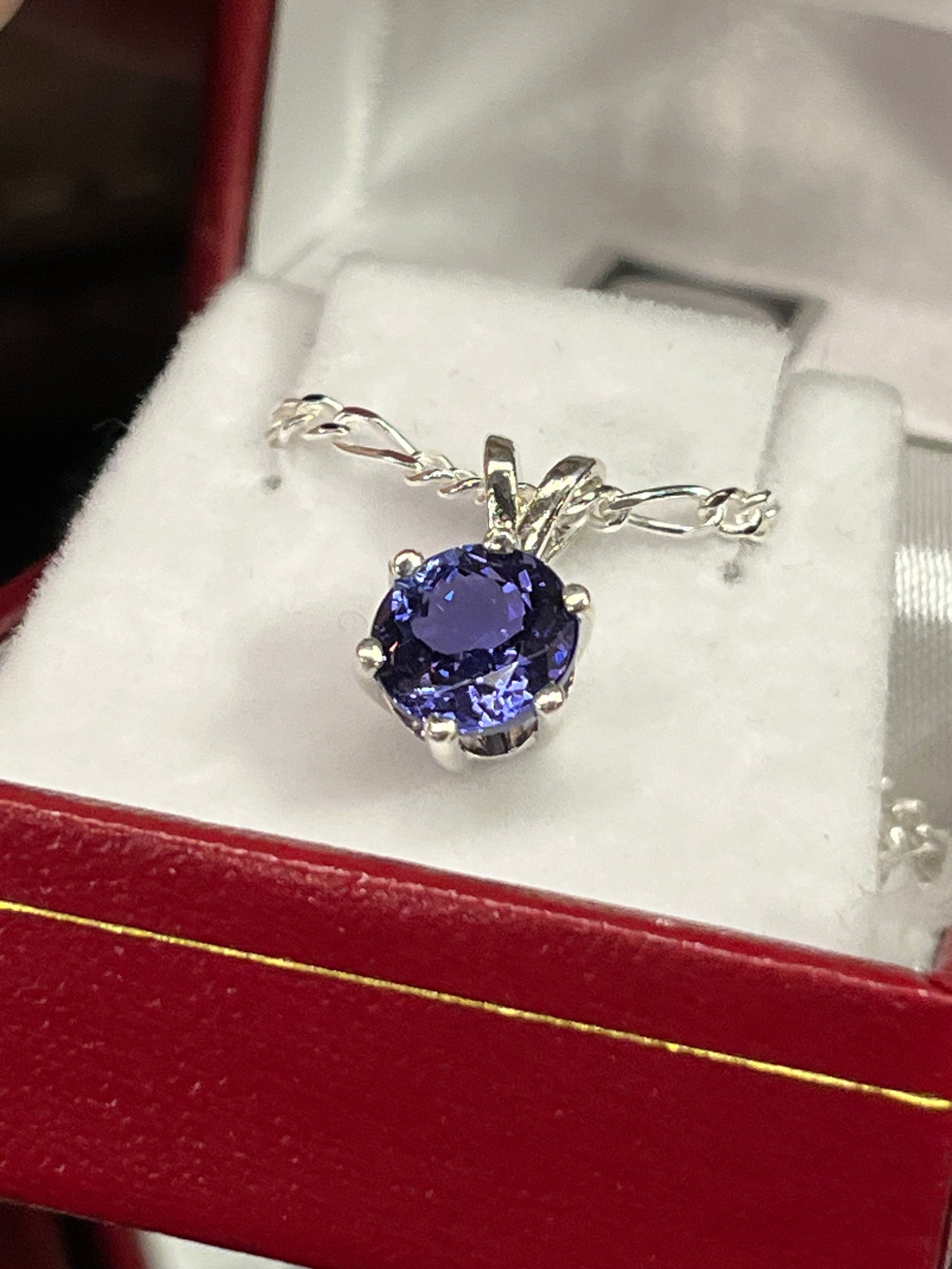 Round 2.29 carat Tanzanite pendant 8mm in silver This unique piece of jewelry is authentic art created by an enrolled member of an Alaska Native tribe. Certified Silver Hand and Made in Alaska jewelry.