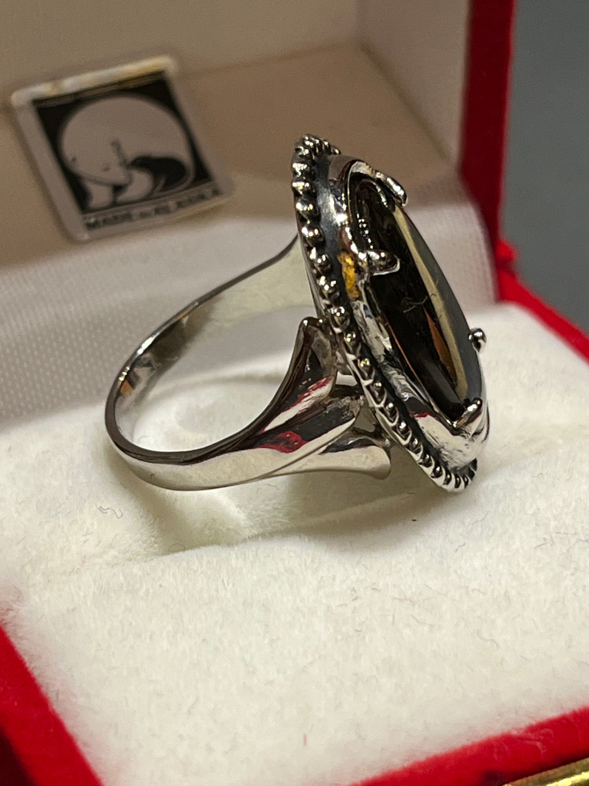 Antique Silver Ring with Black Sapphire (size 6 1/4). This unique piece of jewelry is authentic Alaska Native art created by an enrolled member of an Alaska Native tribe. Certified Silver Hand and Made in Alaska jewelry.