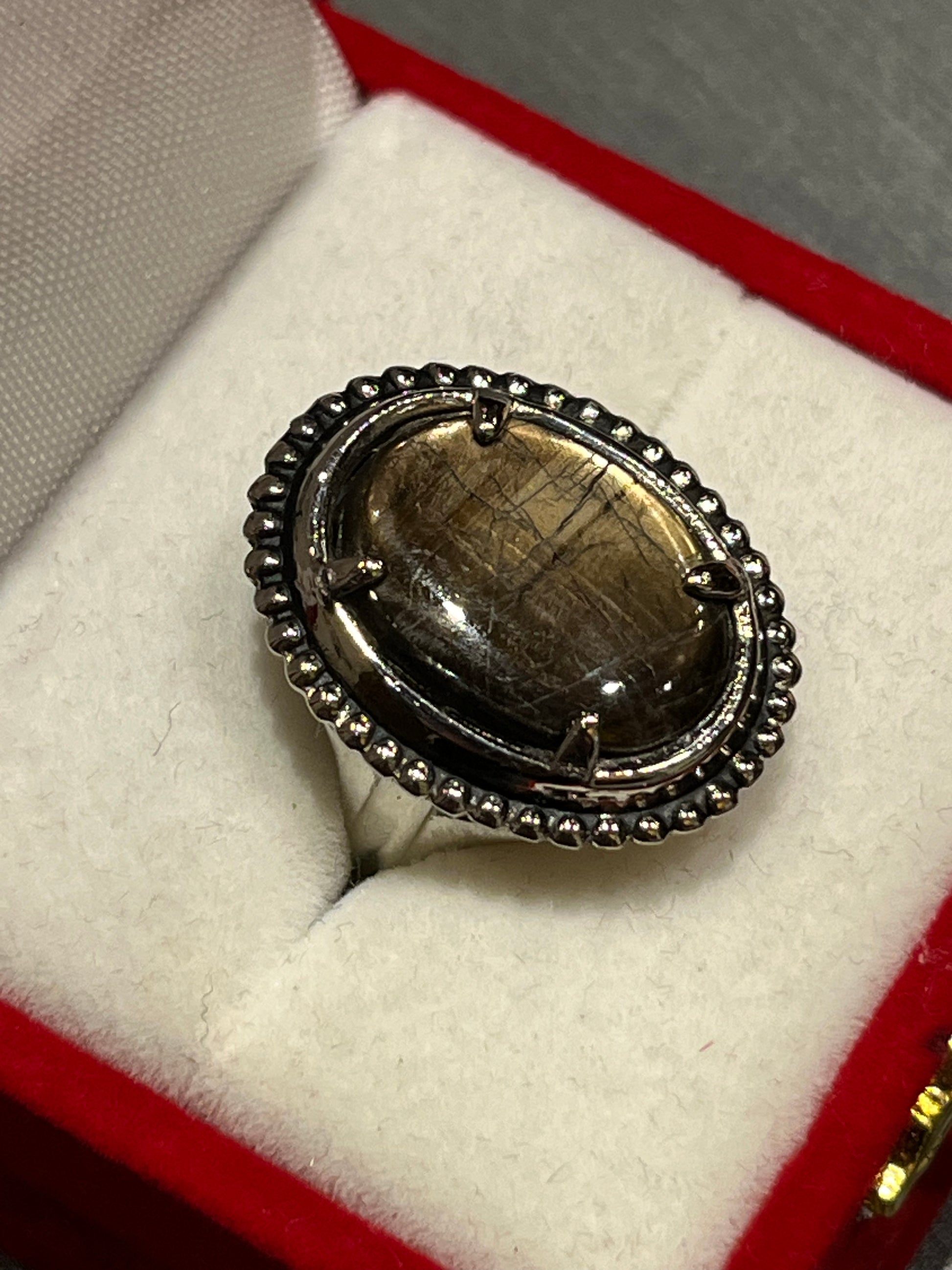 Antique Silver Ring with Black Sapphire (size 6 1/4). This unique piece of jewelry is authentic Alaska Native art created by an enrolled member of an Alaska Native tribe. Certified Silver Hand and Made in Alaska jewelry.