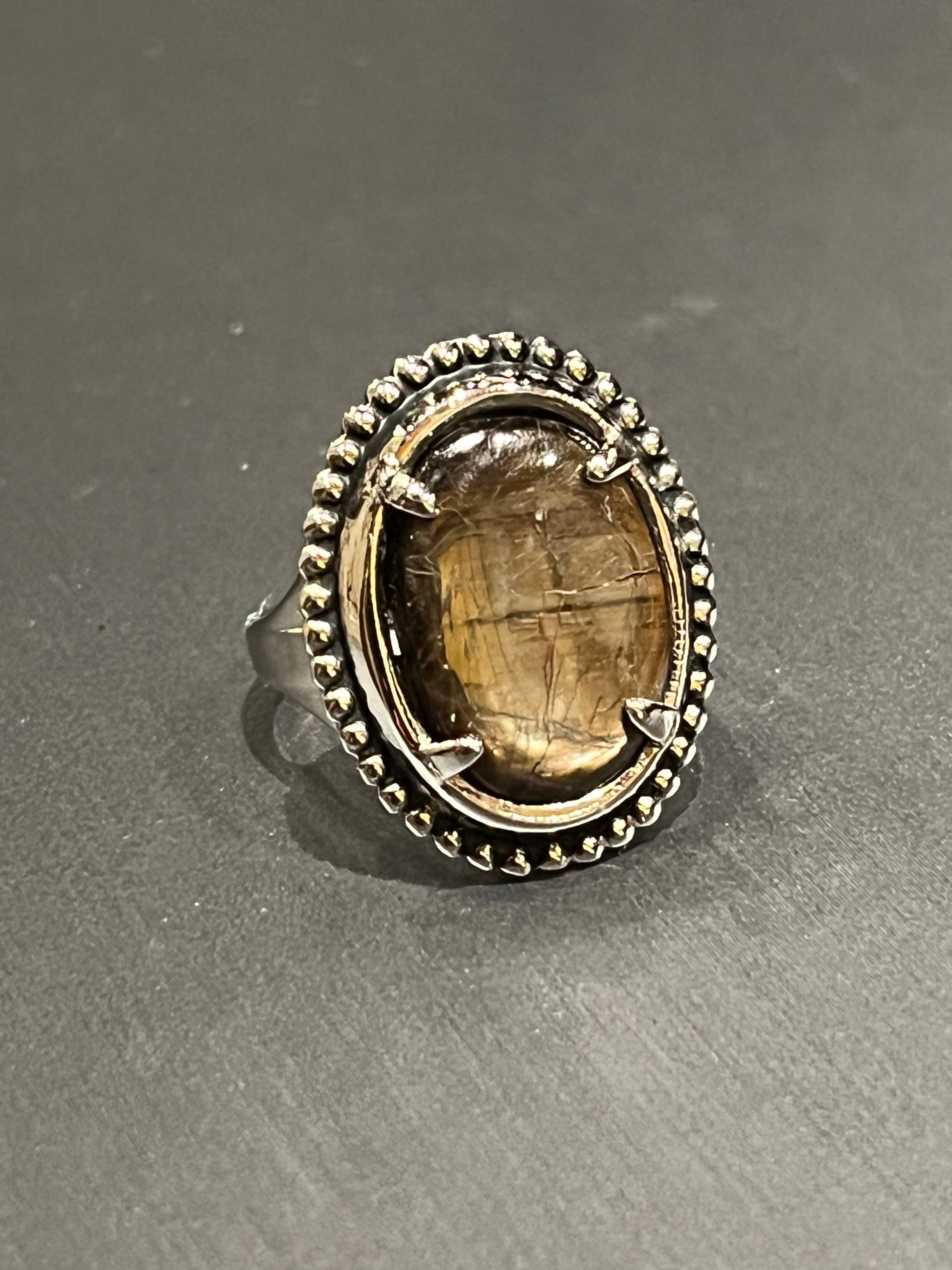 Antique Silver Ring with Black Sapphire (size 6 1/4). This unique piece of jewelry is authentic Alaska Native art created by an enrolled member of an Alaska Native tribe. Certified Silver Hand and Made in Alaska jewelry.