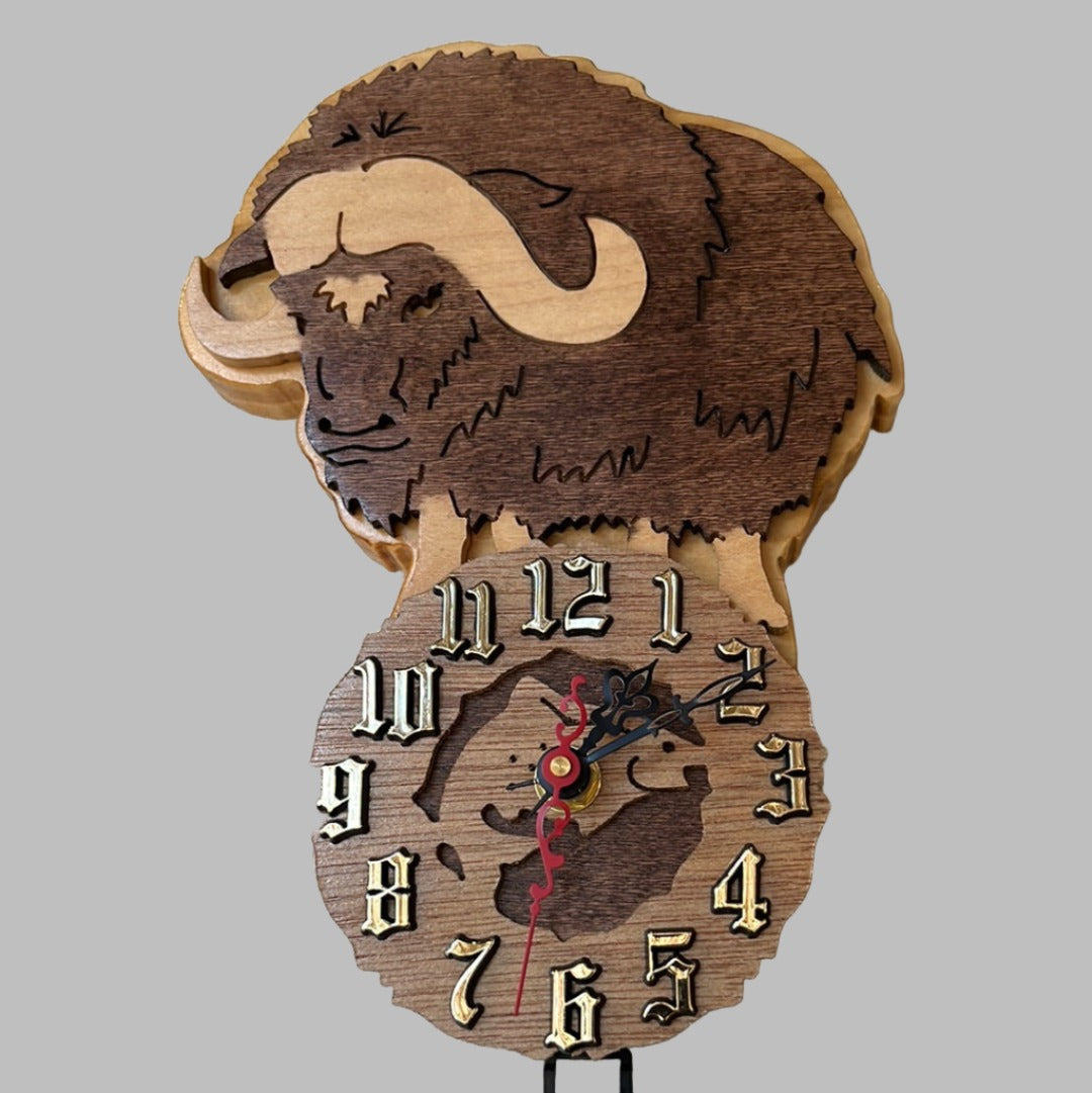 Wooden musk ox pendulum clock