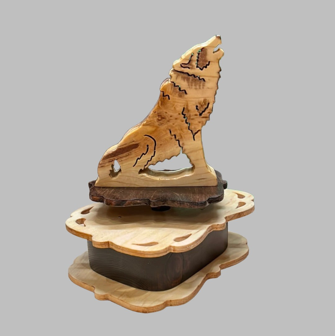 Wooden wolf music box, hand scroll sawed, plays "You Light Up My Life".